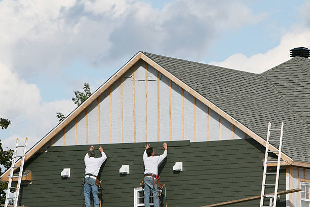 Professional Siding Contractor technician working in Silver Spring, MD